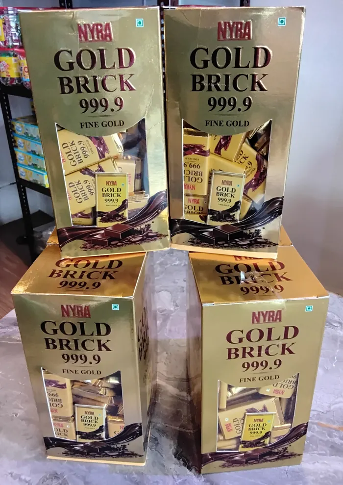 NYRA Gold Brick 999.9 Fine Gold chocolate cartons