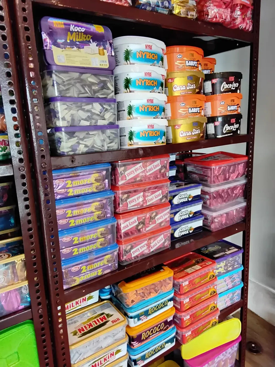 Coconut and cream chocolate bar range including Nyrich, Barfi and Rococo